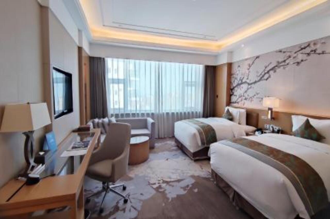 Howard Johnson Xiangyu Plaza Linyi Ліньї Екстер'єр фото